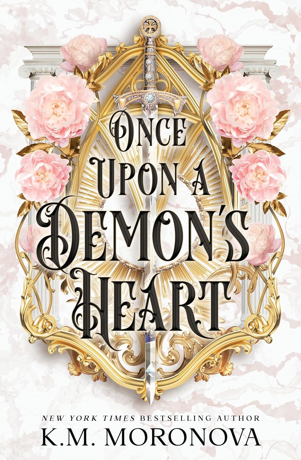 Once Upon a Demon's Heart and Once Written in Gilded Blood paperback books fanned out showing spines and back cover blurbs