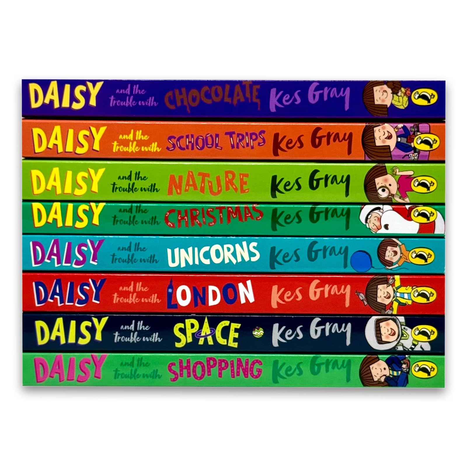 Close-up of the front covers of Daisy and the Trouble with Chocolate and Daisy and the Trouble with Christmas paperbacks from the Kes Gray Daisy collection