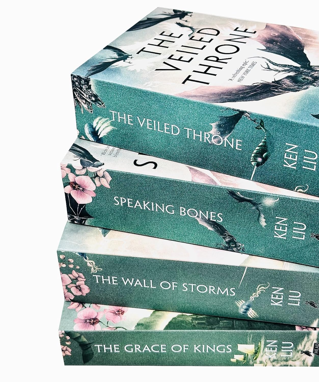 The Dandelion Dynasty 4 Books Collection Set by Ken Liu, paperback — close-up of two paperback covers from the set with detailed fantasy artwork.