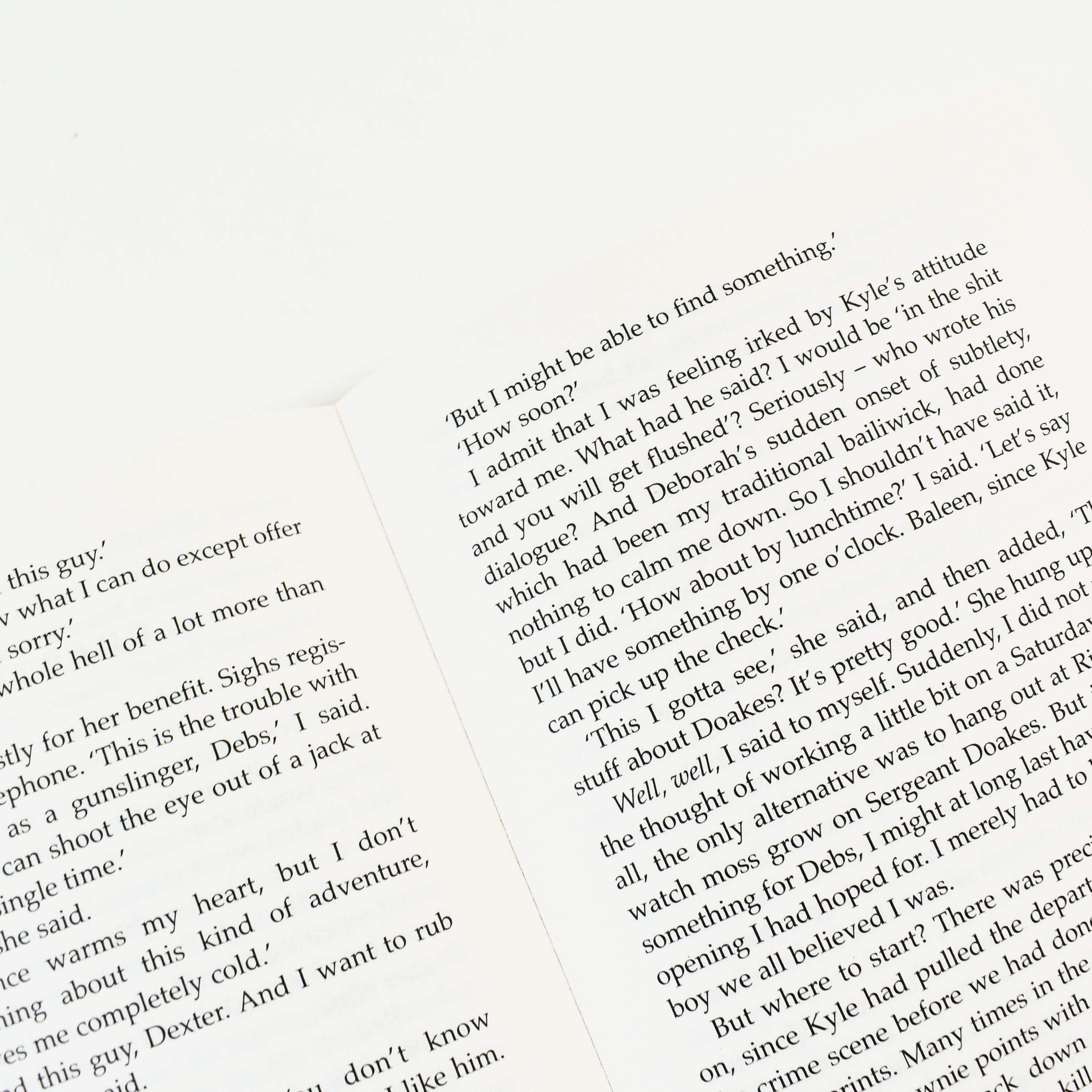 Angled view of the Dexter Series by Jeff Lindsay 8 books collection set displaying the paperback cover artwork.