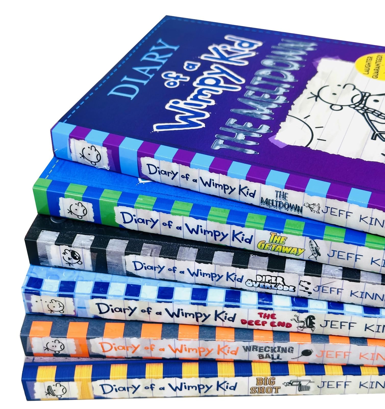 Stacked view of the six Diary of a Wimpy Kid paperback books, Books 12-17, by Jeff Kinney, Puffin edition.