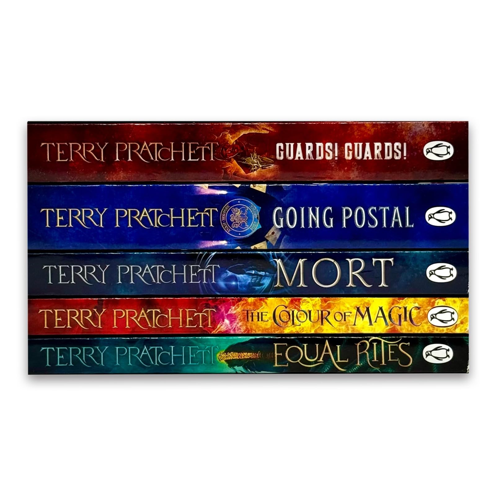 Close-up of The Colour of Magic and Equal Rites paperback covers from the Discworld novels collection set