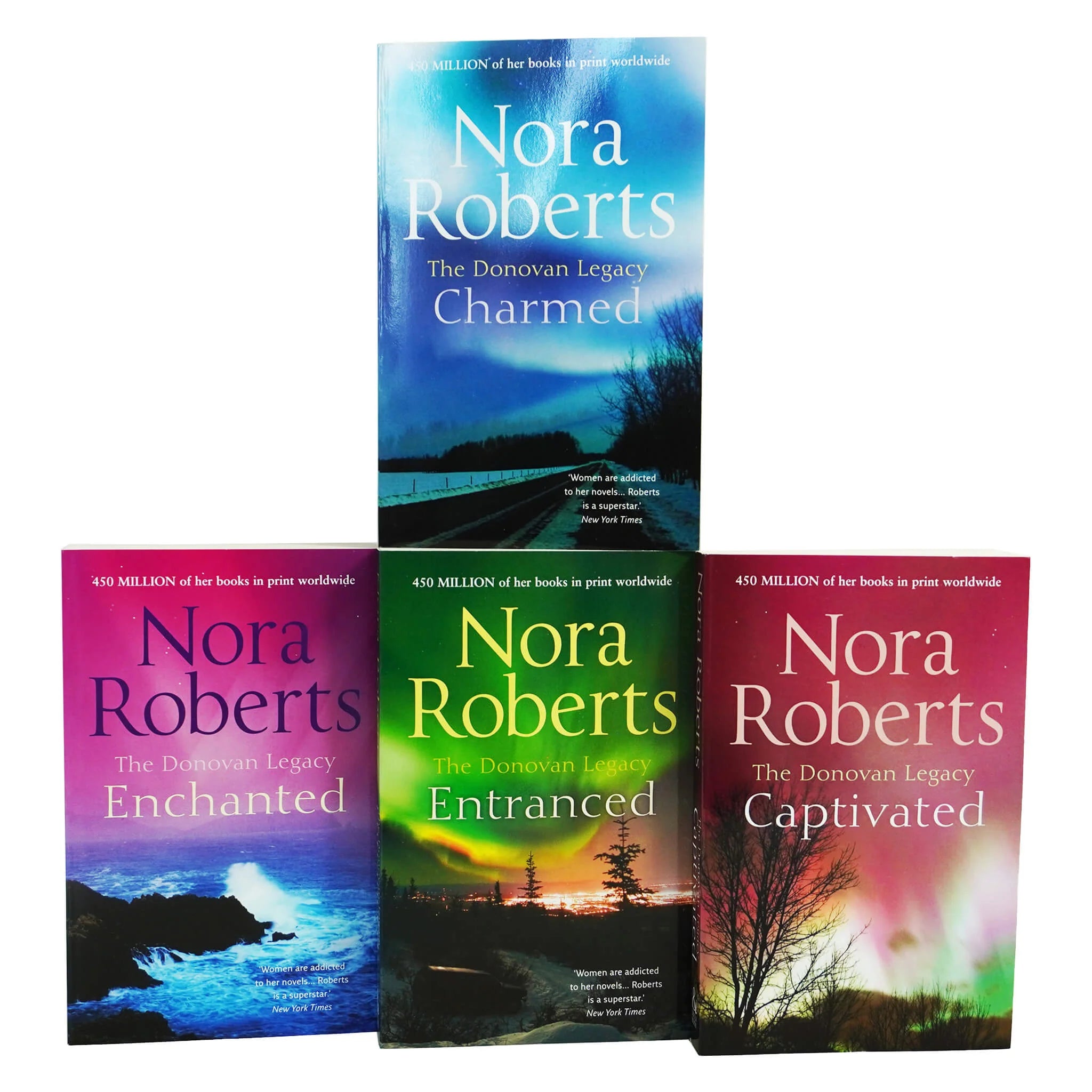 Full front view of all four Donovan Legacy paperback books by Nora Roberts arranged together in the collection set.