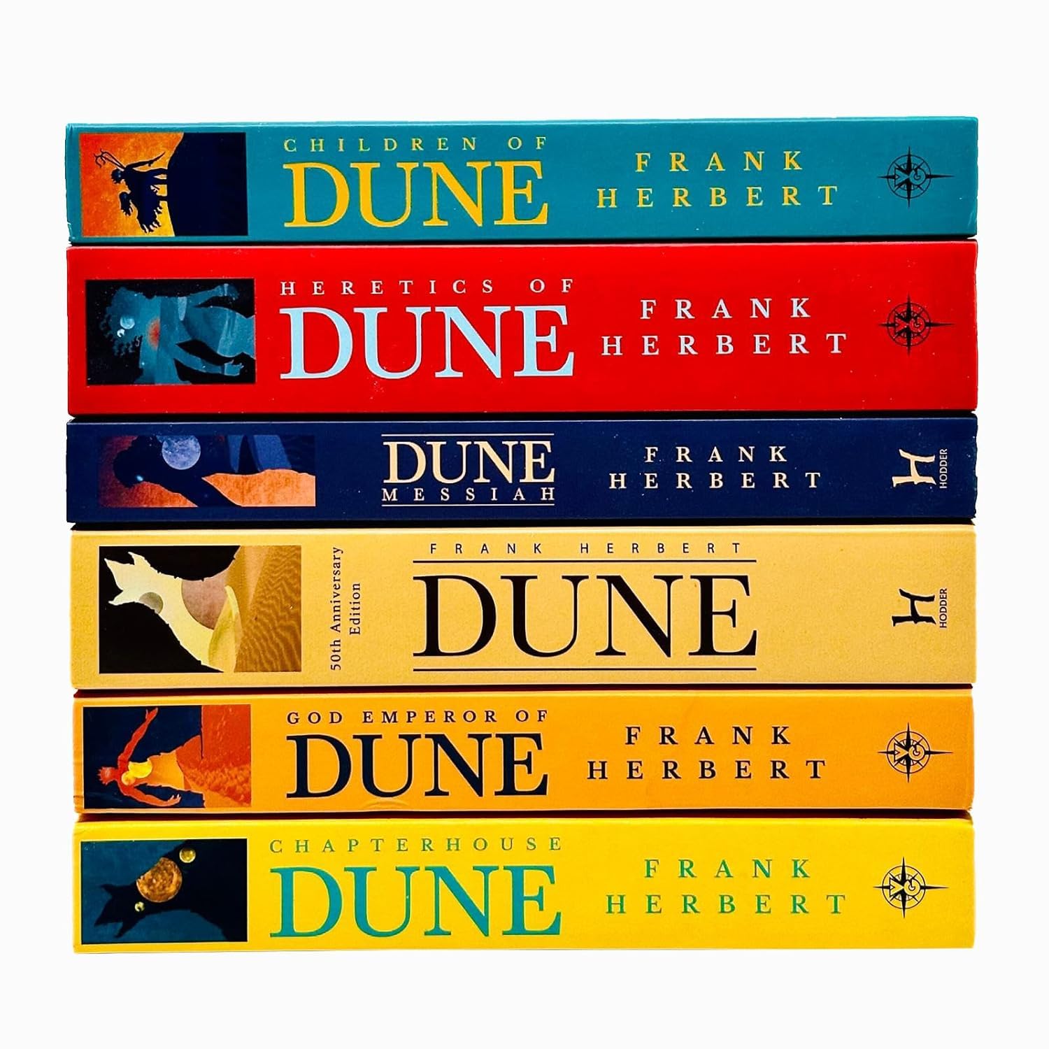 Close-up of the Dune Series paperback covers by Frank Herbert, including Dune, Dune Messiah, and Children of Dune.