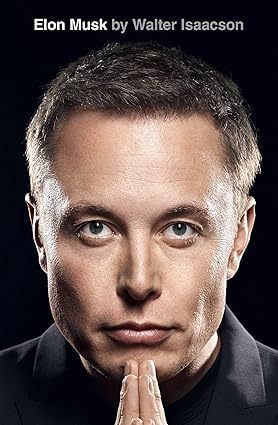 Close-up of the hardcover spines and dust jackets for Elon Musk and Making It So, showing the two nonfiction biography titles side by side.