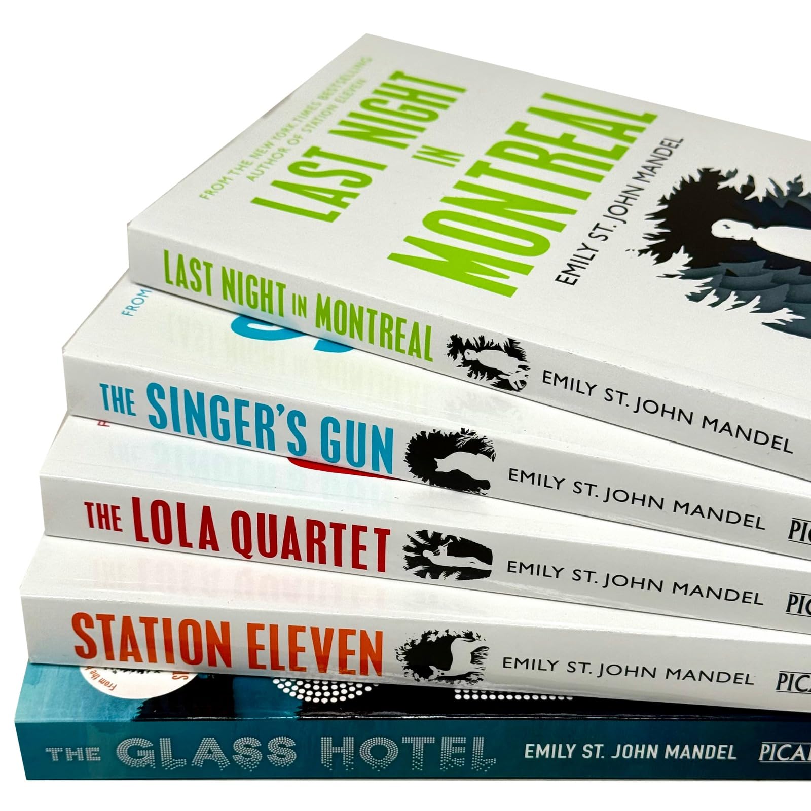 Close-up of The Glass Hotel paperback cover by Emily St. John Mandel from the 5 book collection set