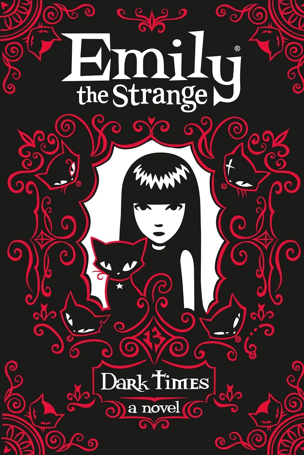 All four Emily the Strange hardcover books fanned out showing the complete collection set