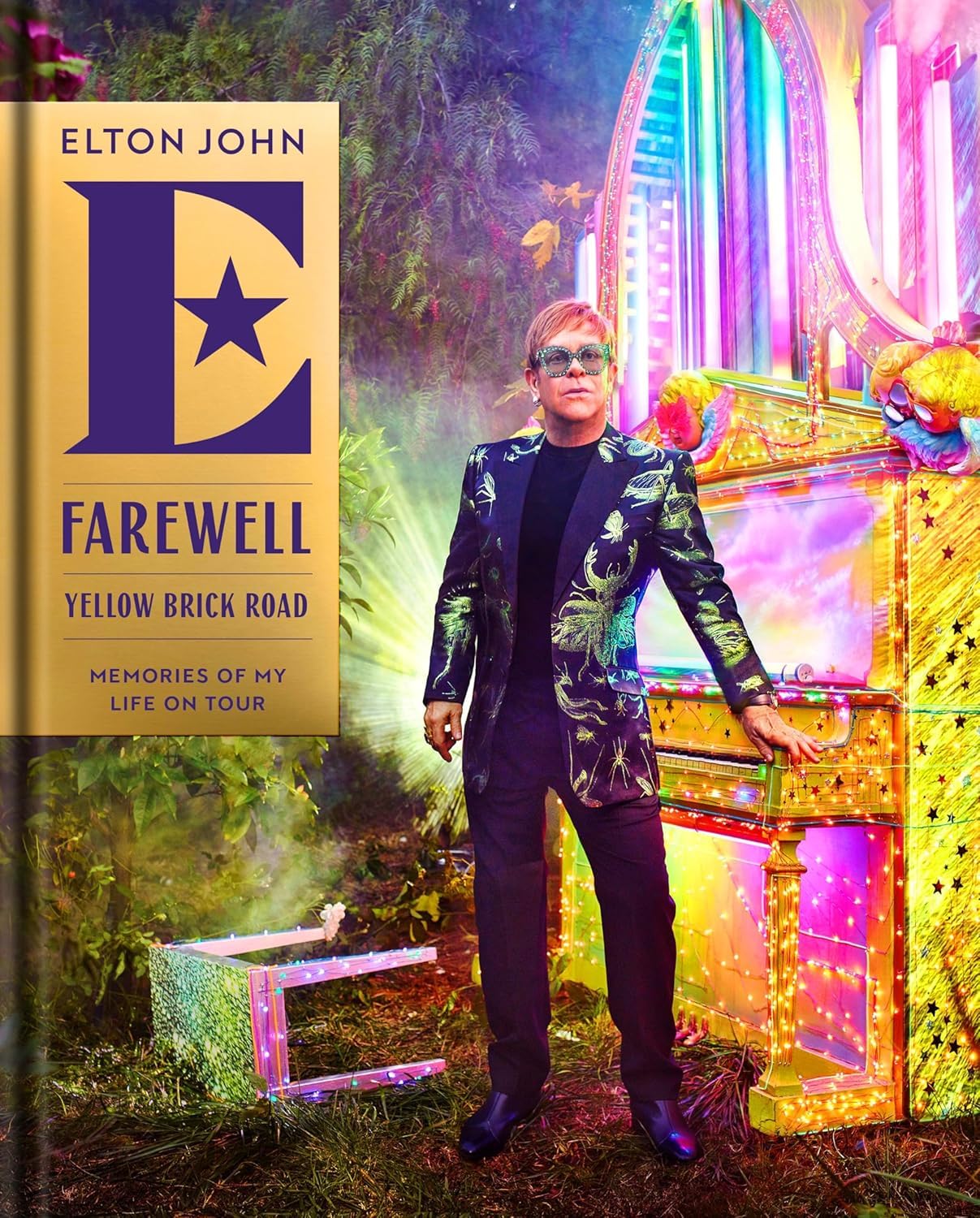 Back cover detail of Elton John's Farewell Yellow Brick Road hardcover tour memoir and Me paperback autobiography