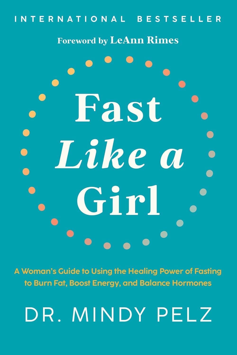 The Official Fast Like a Girl Journal paperback interior spread showing 60-day fasting tracking pages