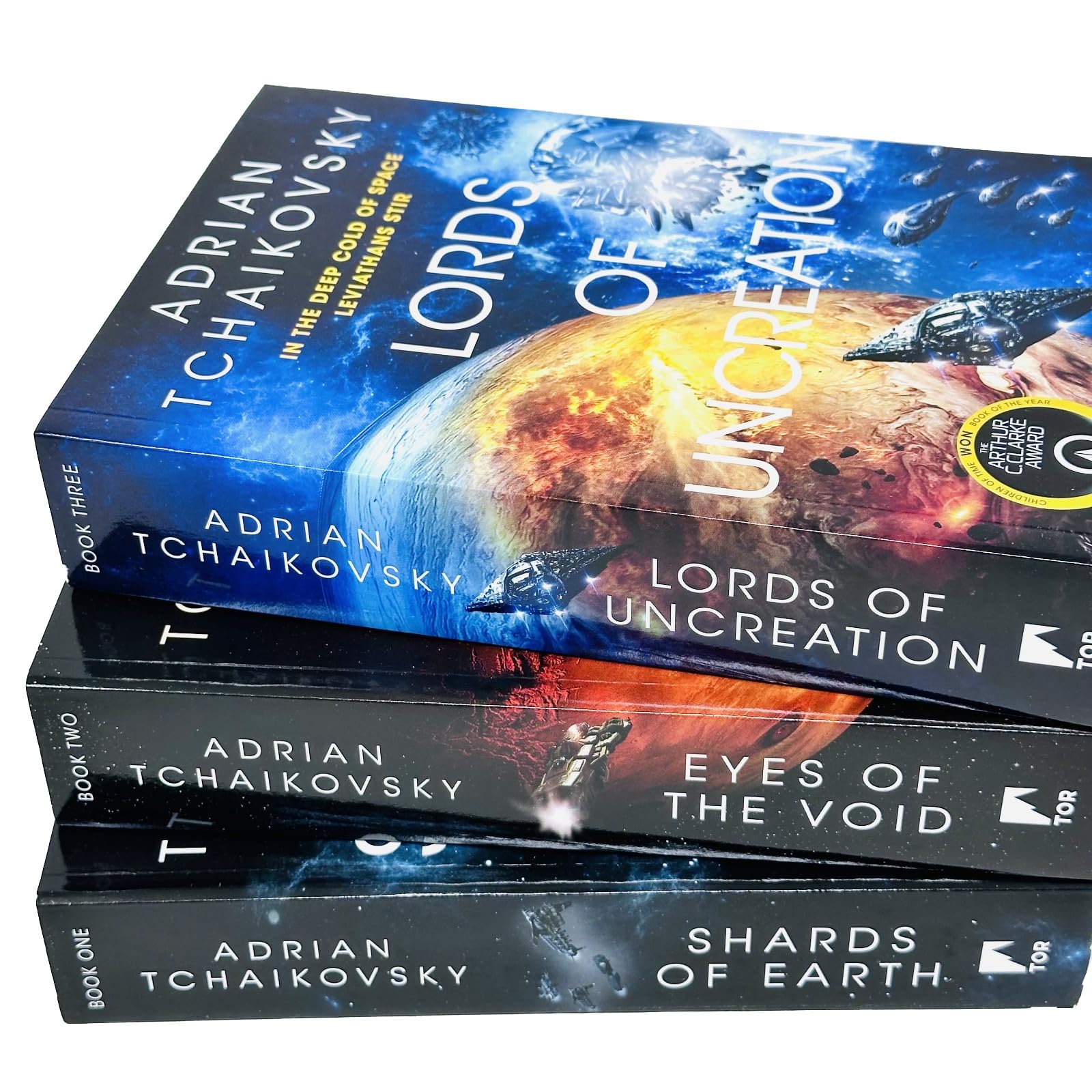 Angled view of the three-book Final Architecture paperback set showing spine and cover details