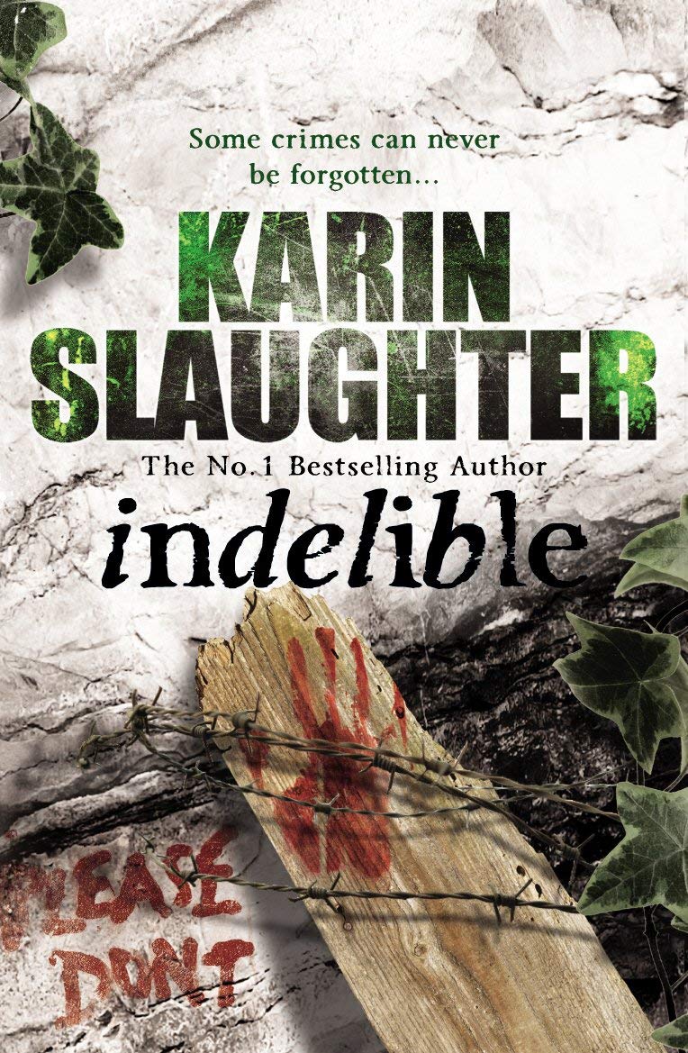 Close-up of Grant County paperback book spines by Karin Slaughter showing titles Blindsighted, Kisscut, A Faint Cold Fear, Indelible and Faithless