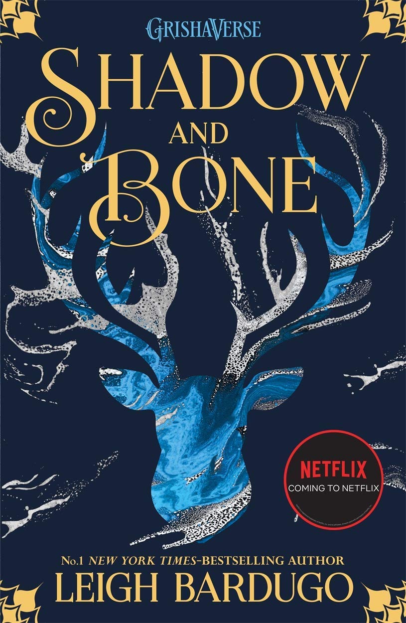 Close-up of the Six of Crows and Crooked Kingdom paperback covers from the Grishaverse collection