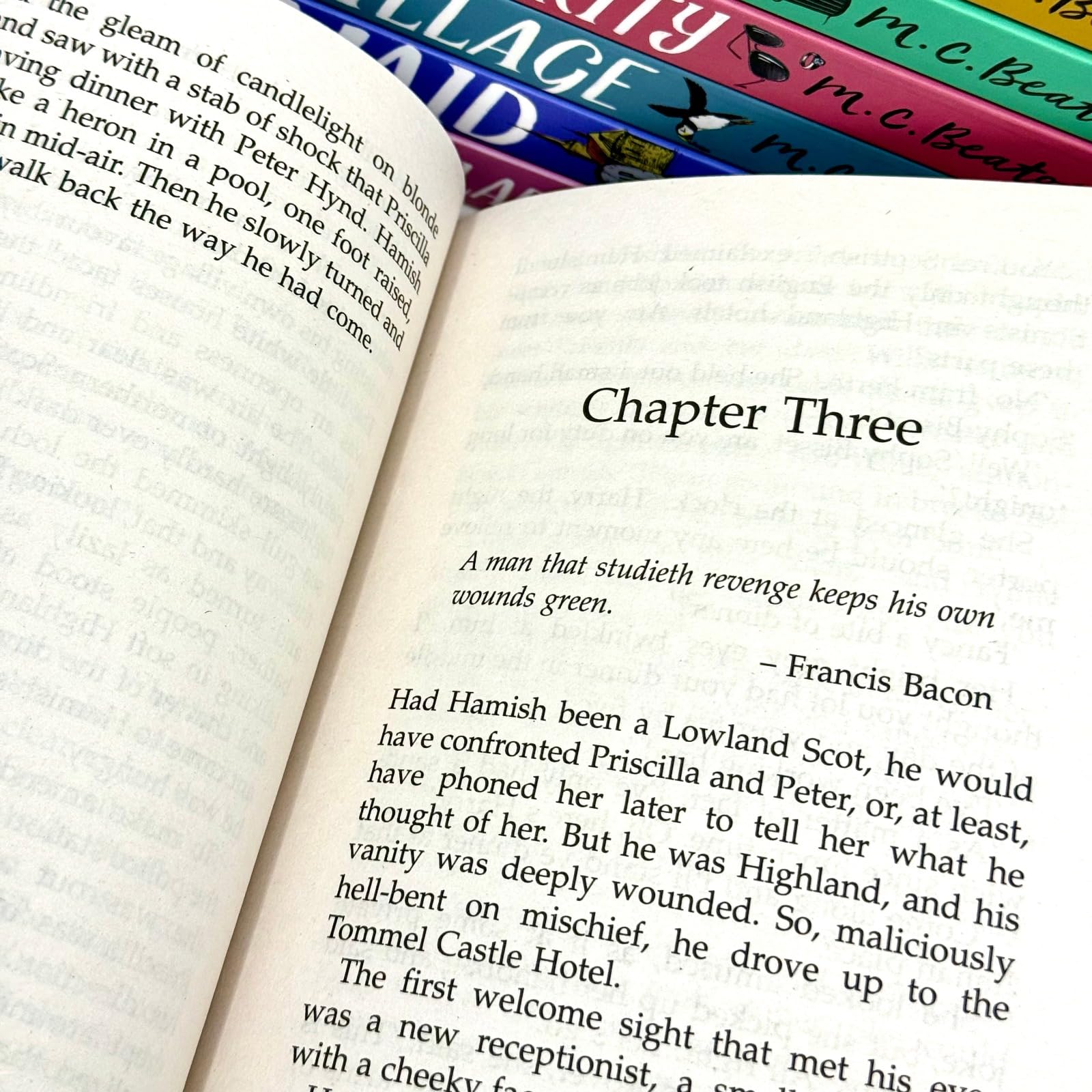 Hamish Macbeth Mysteries by M.C. Beaton, close-up of paperback covers featuring Death of a Charming Man and other titles