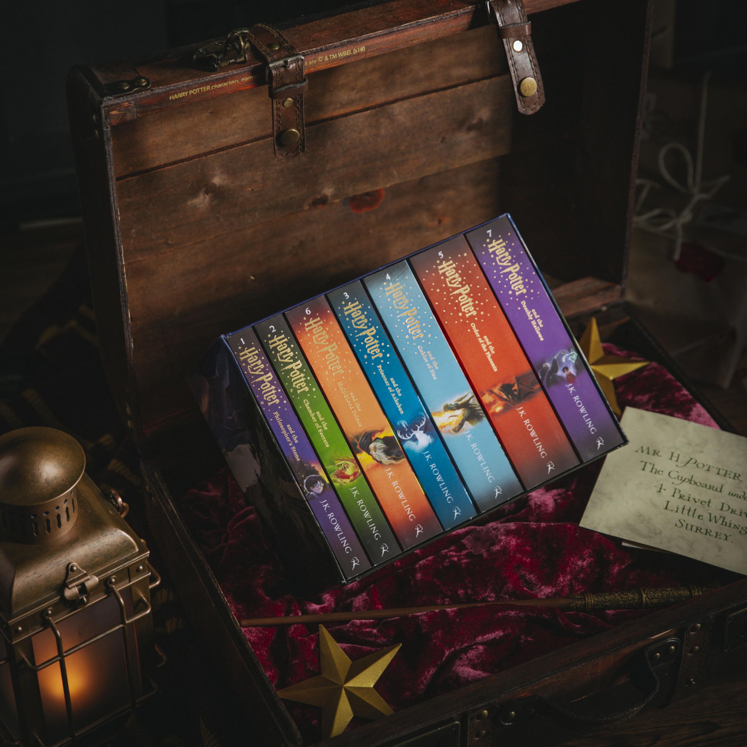 Close-up of the Harry Potter paperback box set spines and cover art by J.K. Rowling.