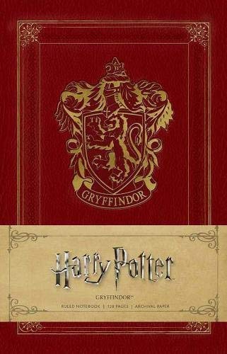Close-up of Gryffindor Ruled Notebook cover artwork showing house concept art and paperback binding