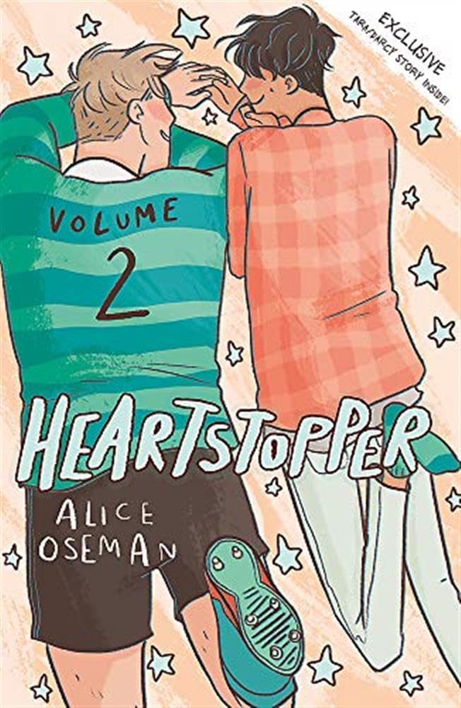 Heartstopper Volume covers close-up showing Charlie and Nick illustrated artwork