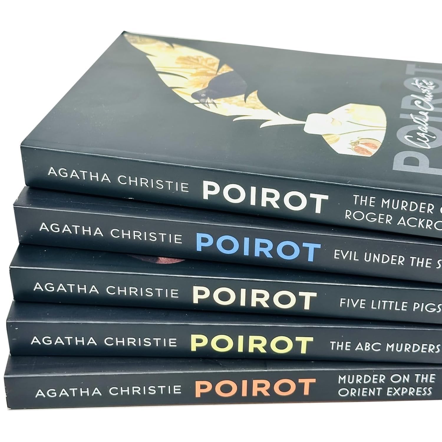 Hercule Poirot 5 book paperback set with colorful covers stacked together on a table.