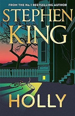 Both paperback books, Holly by Stephen King and Lord of the Flies by William Golding, shown together as a set