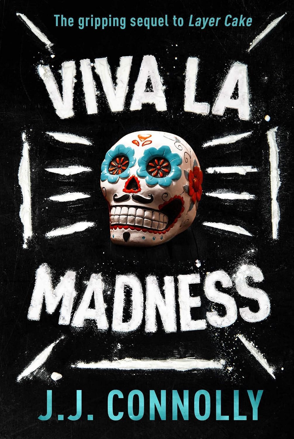 Both paperback books in the J. J. Connolly Layer Cake and Viva La Madness collection set shown together