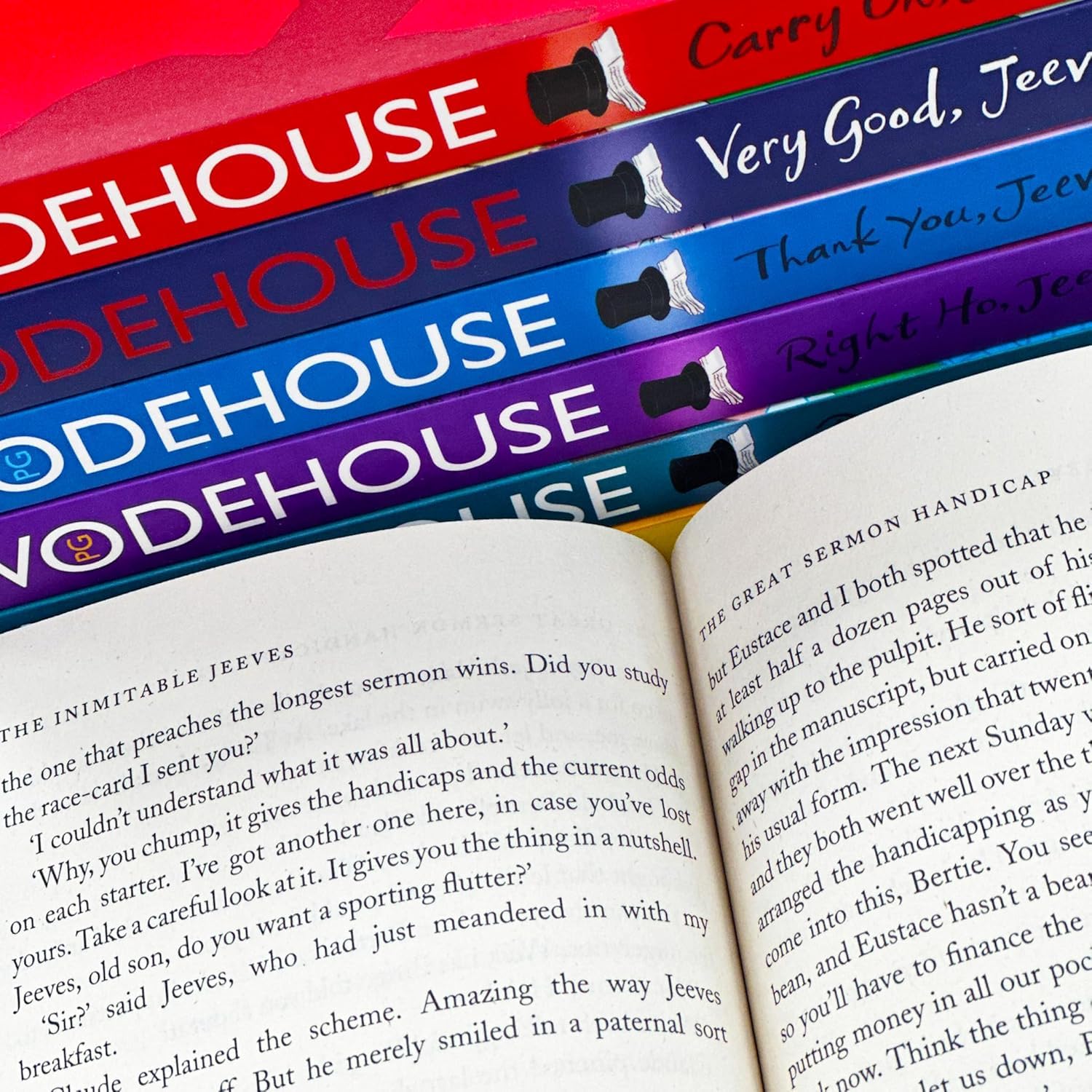 Close-up of the Jeeves and Wooster paperback set spines showing all seven book titles by P.G. Wodehouse