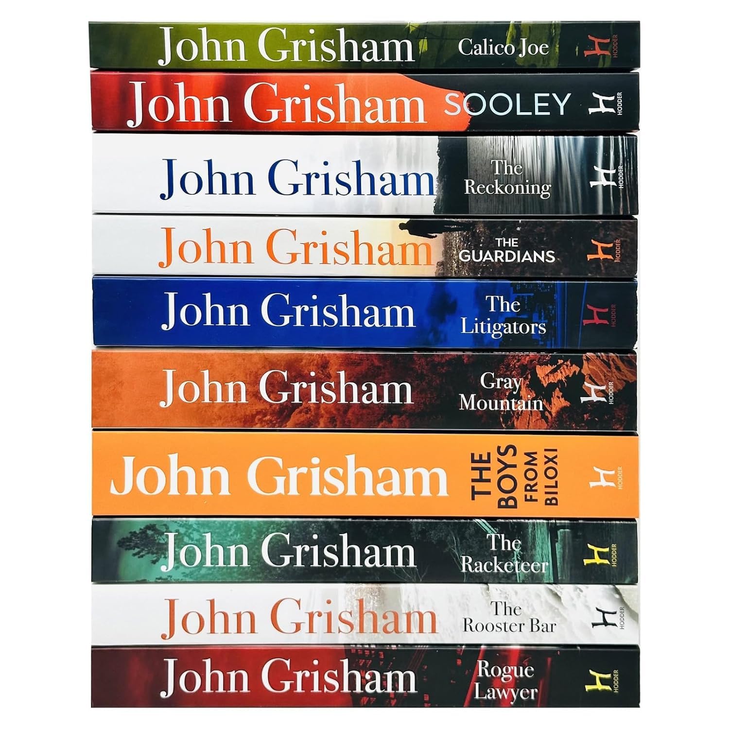 All ten John Grisham paperback novels fanned out showing spines and titles including The Reckoning and The Litigators