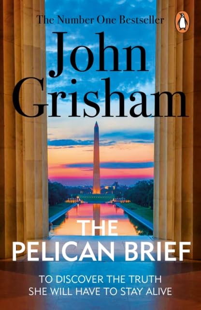 Close-up of The Runaway Jury and The Partner paperback covers by John Grisham from the Legal Classics 6 books set