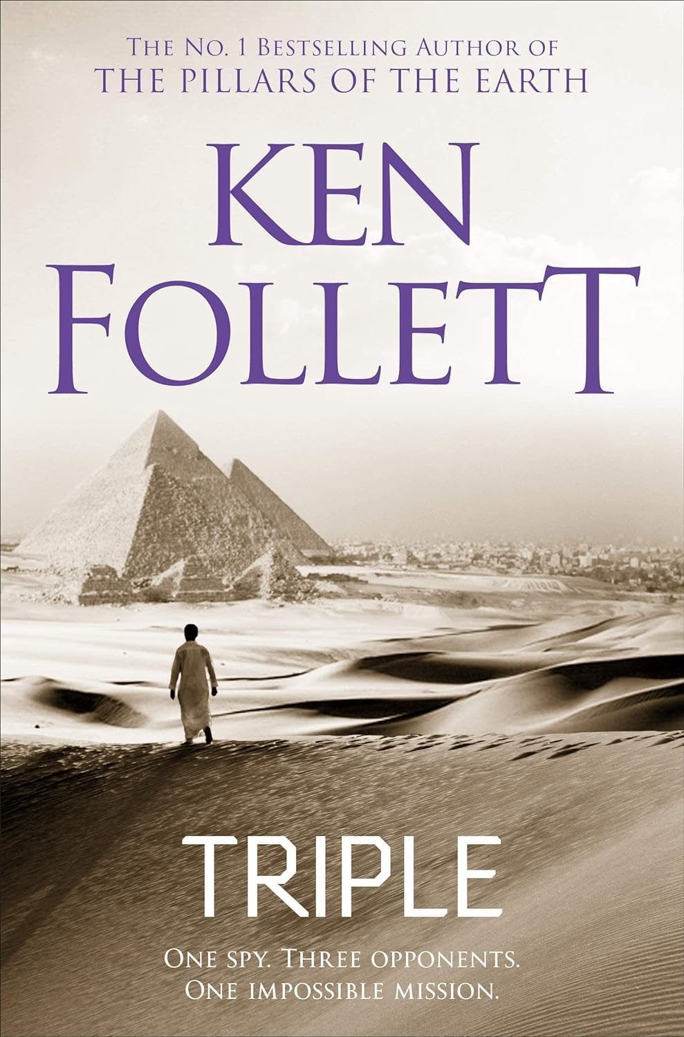 Close-up of an inside page spread from one of the Ken Follett paperback spy thriller novels