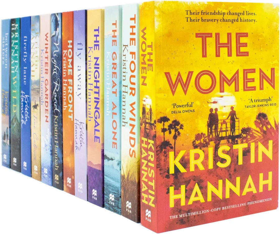 Close-up of the Kristin Hannah 12-book paperback collection stacked together showing spine and cover details
