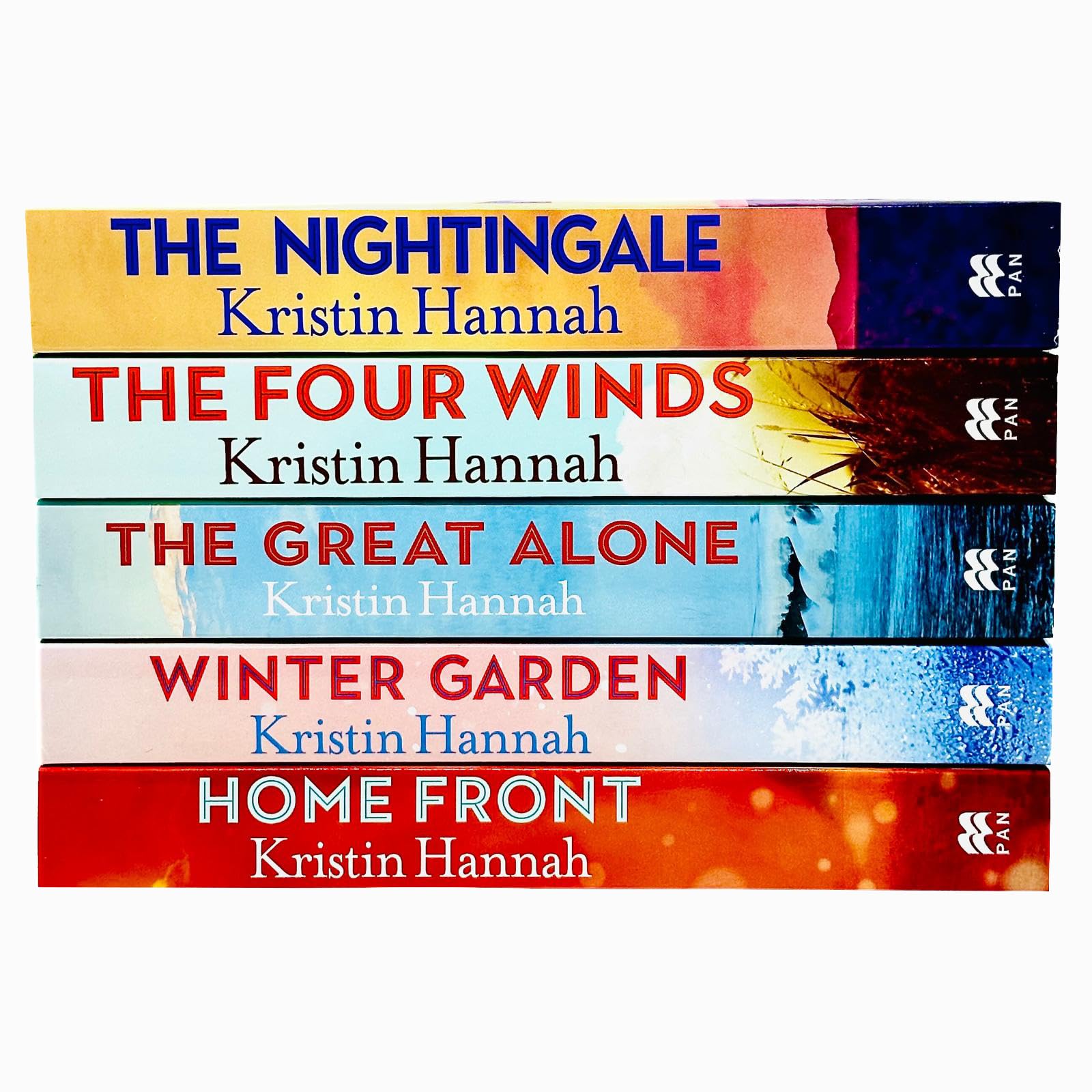 Close-up of the front covers of The Nightingale, The Four Winds, and other titles in the Kristin Hannah paperback set