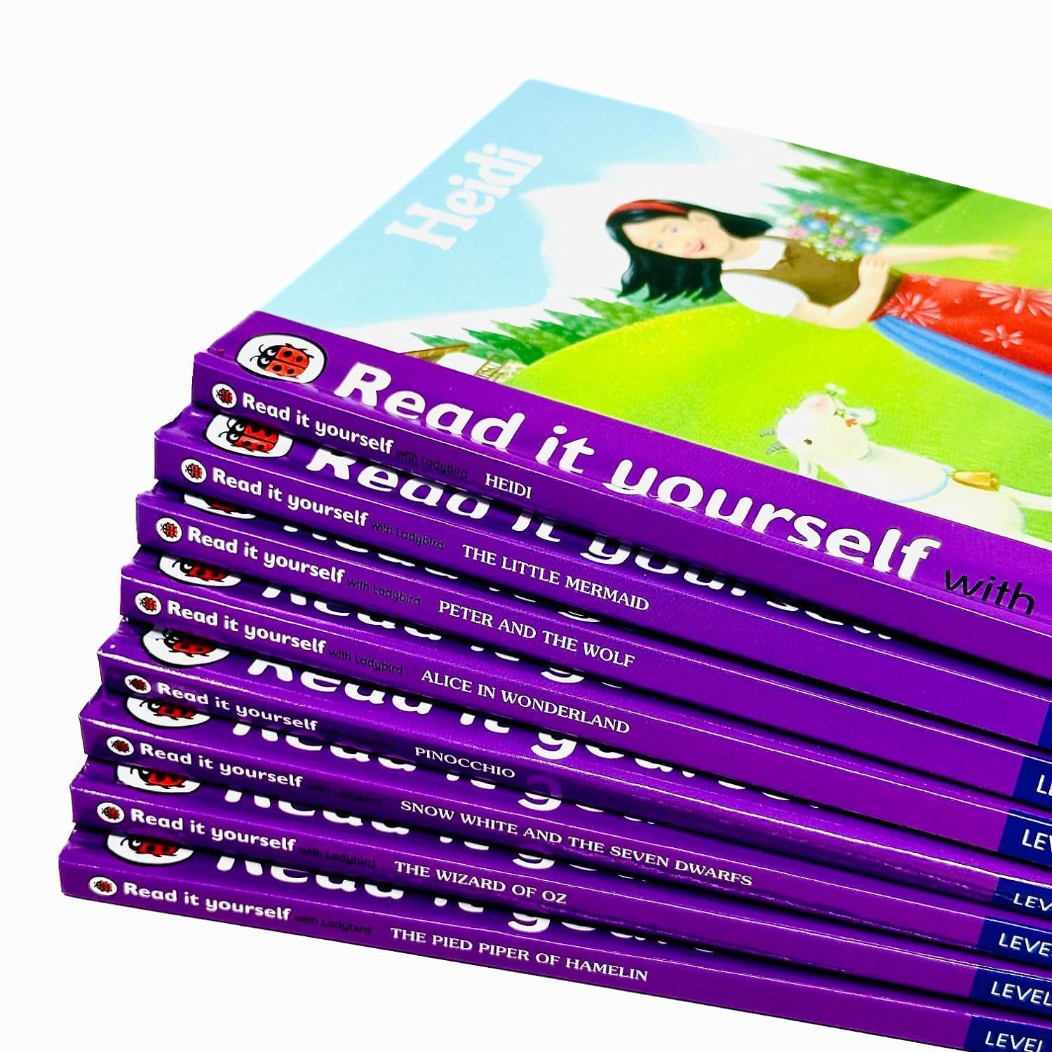 Ladybird Read It Yourself Level 4 paperback books showing Snow White and the Seven Dwarfs and The Wizard of Oz covers