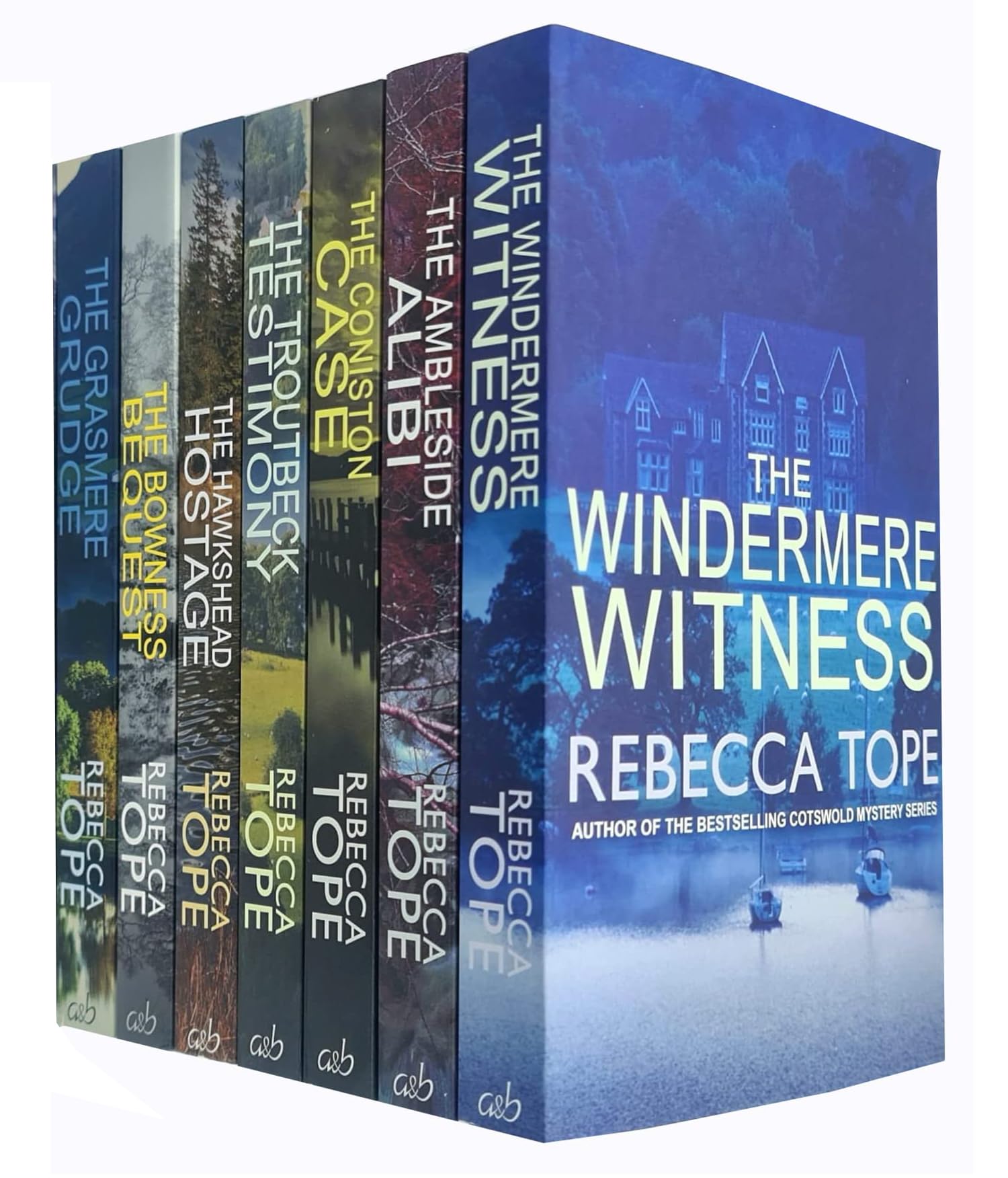 Full 8-book Lake District Mysteries paperback set by Rebecca Tope fanned out showing all spines