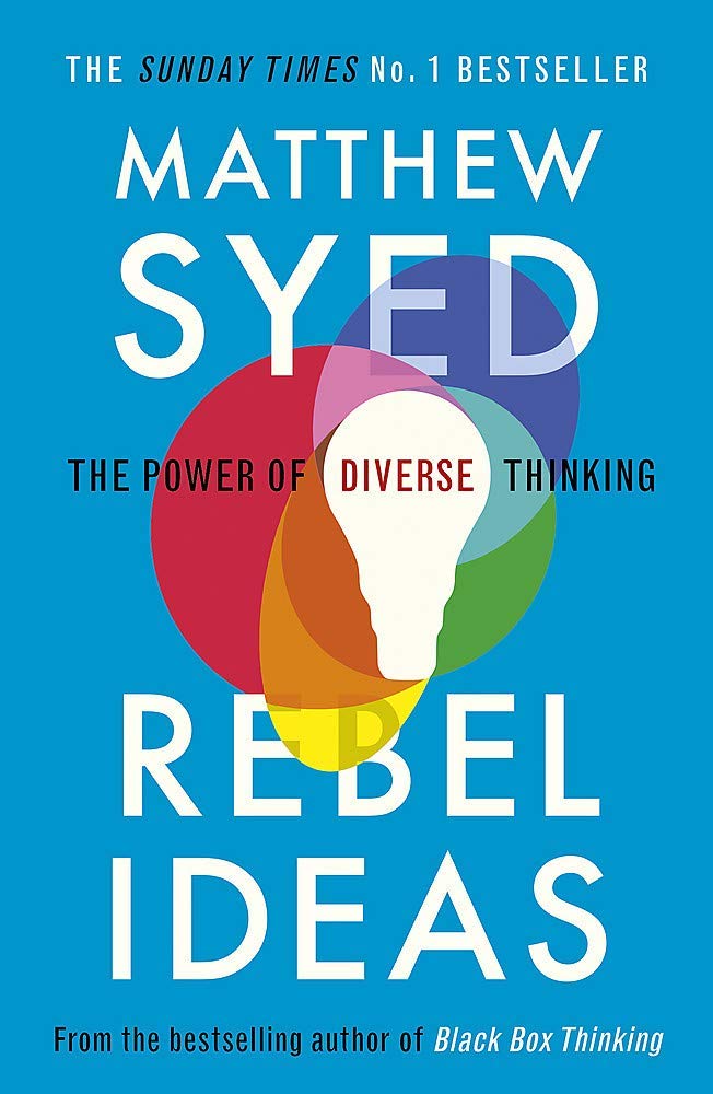 Rebel Ideas and Black Box Thinking paperback books fanned out showing both covers