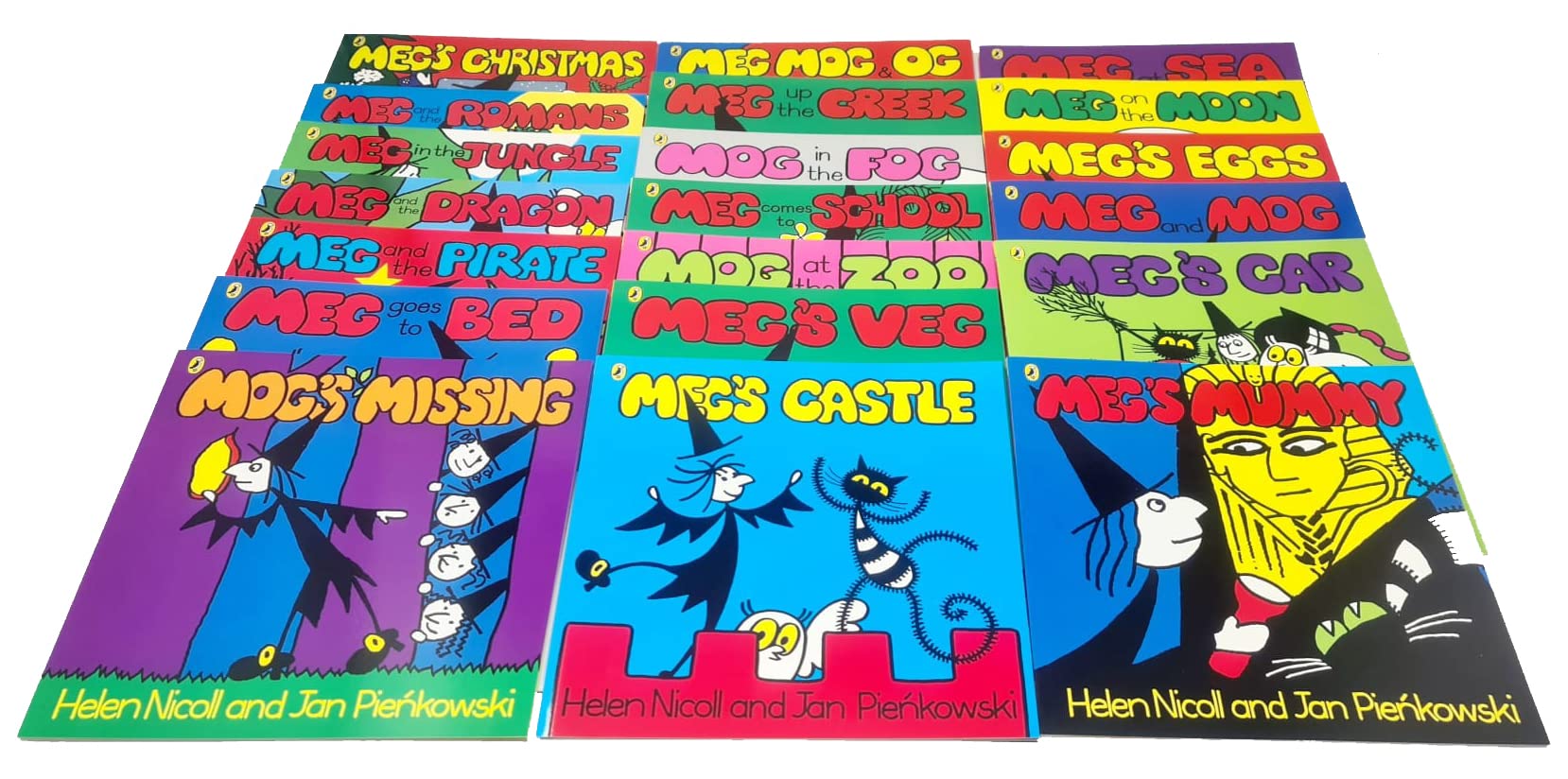 Meg and Mog 20 books fanned out showing colorful covers including Meg's Eggs, Meg on the Moon, and Meg's Christmas