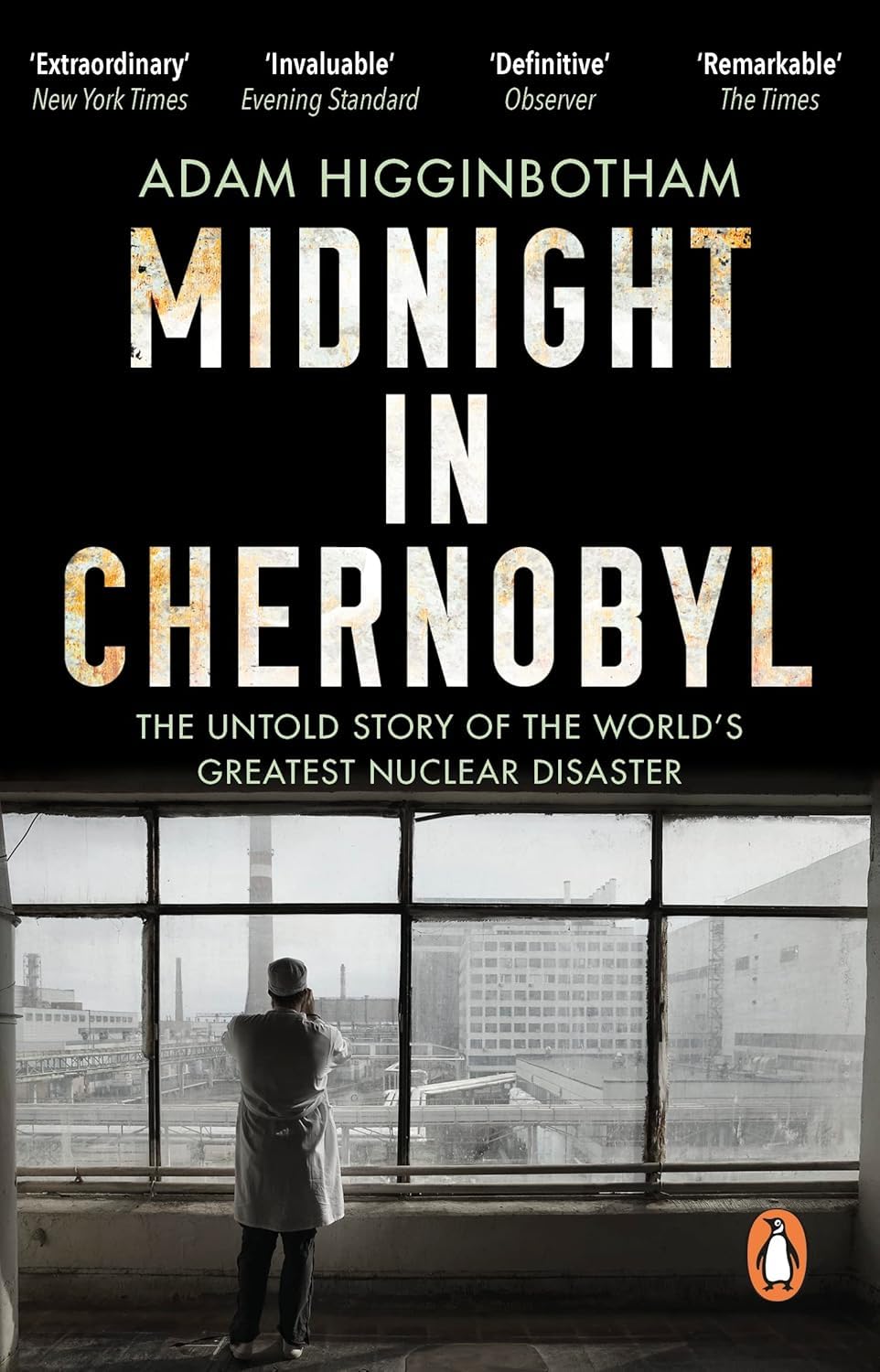 Spine view of Midnight in Chernobyl and Challenger paperback set side by side
