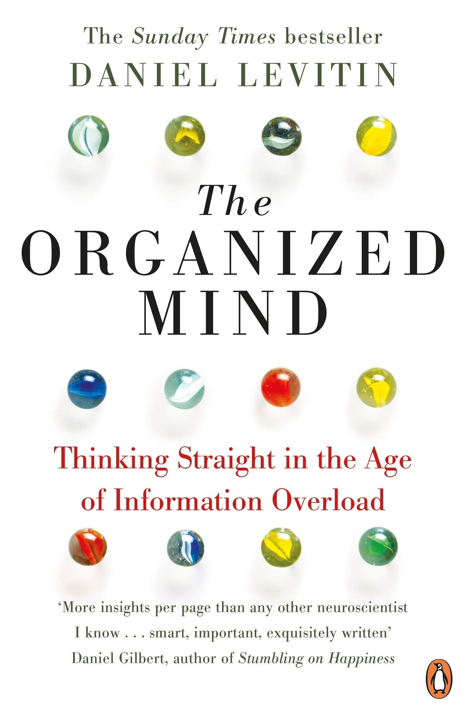 All three Mind Habits paperbacks by Levitin, Duhigg, and Kahneman displayed together on a table
