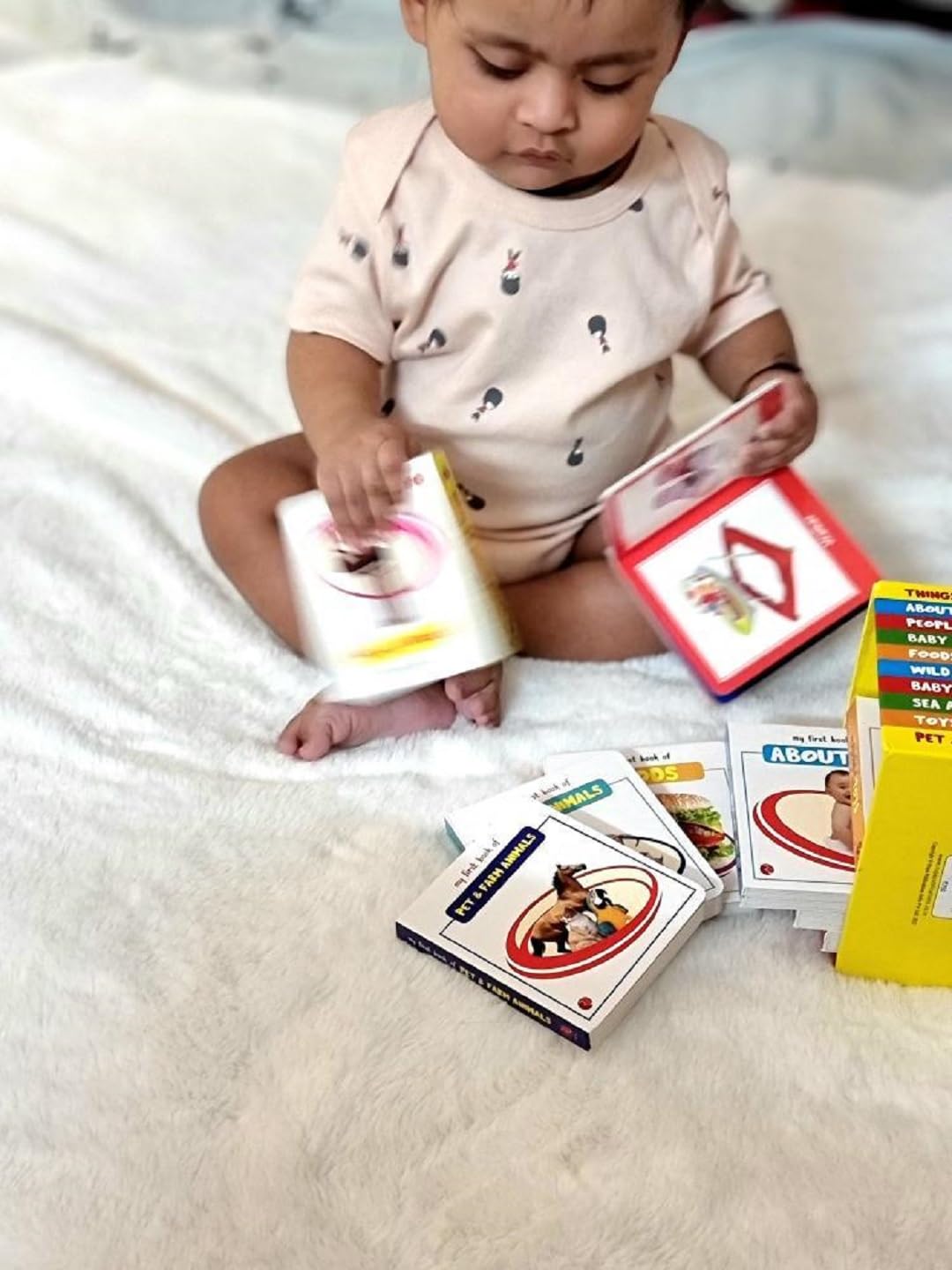 My First Book of ABC board book cover with alphabet letters and photo labels