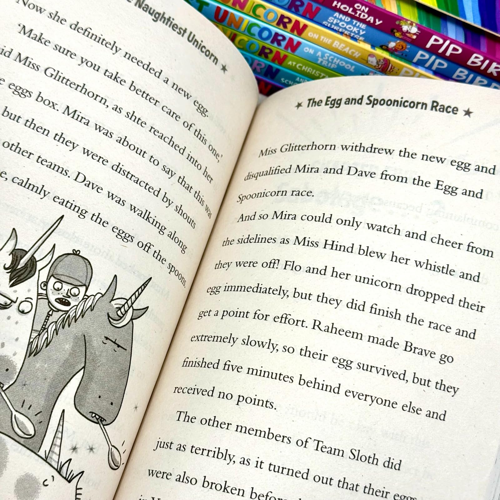 Inside page spread from The Naughtiest Unicorn showing illustrations and chapter text for young readers