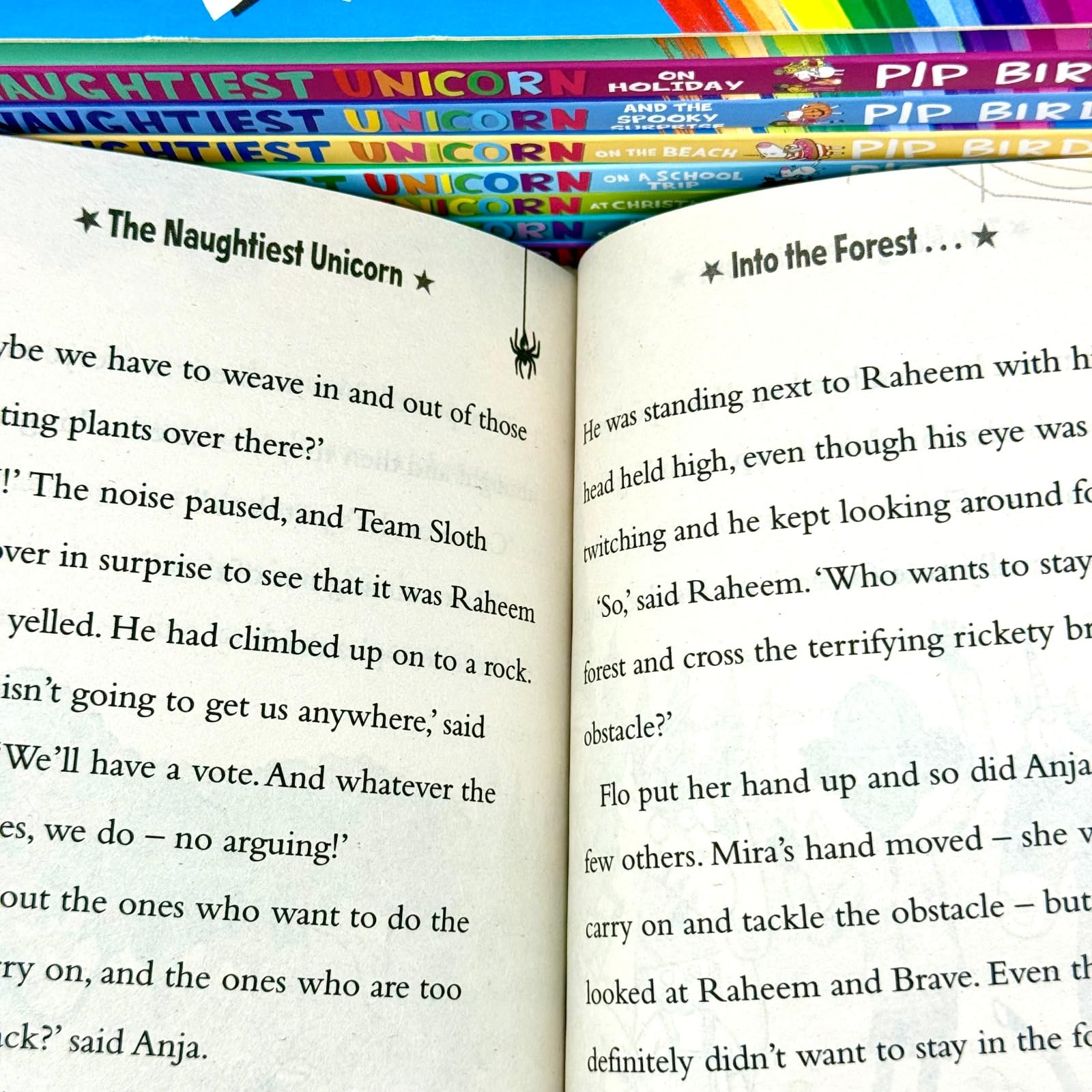 The Naughtiest Unicorn 8-book set stacked together showing spines and Ages 5-8 paperback format