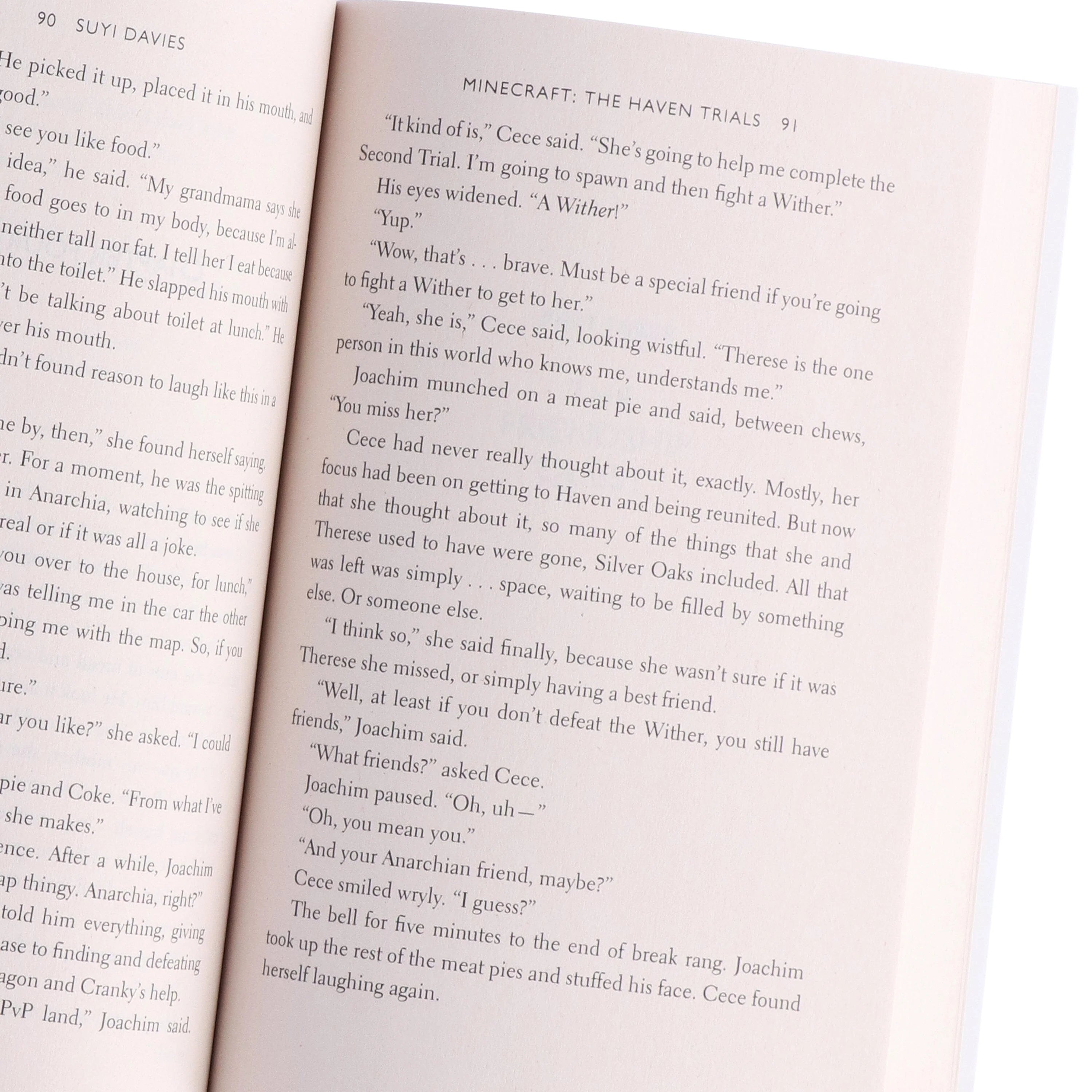 Inside page spread of The Official Minecraft Novels 10 Books Collection Set paperback, showing interior text layout.