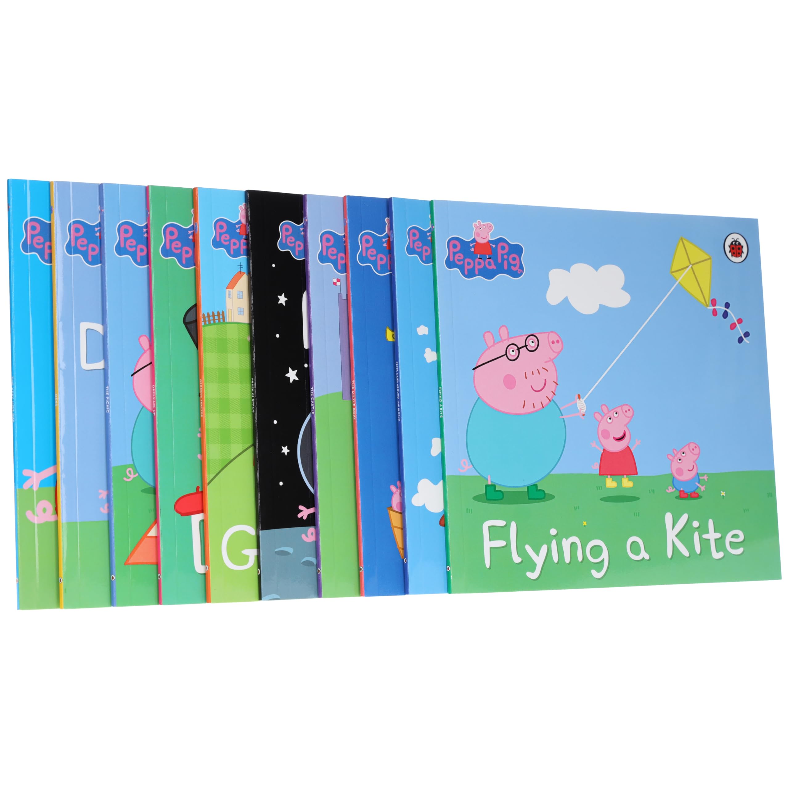 Close-up of Peppa Pig paperback book covers including Peppa Goes Around the World and Peppa in Space