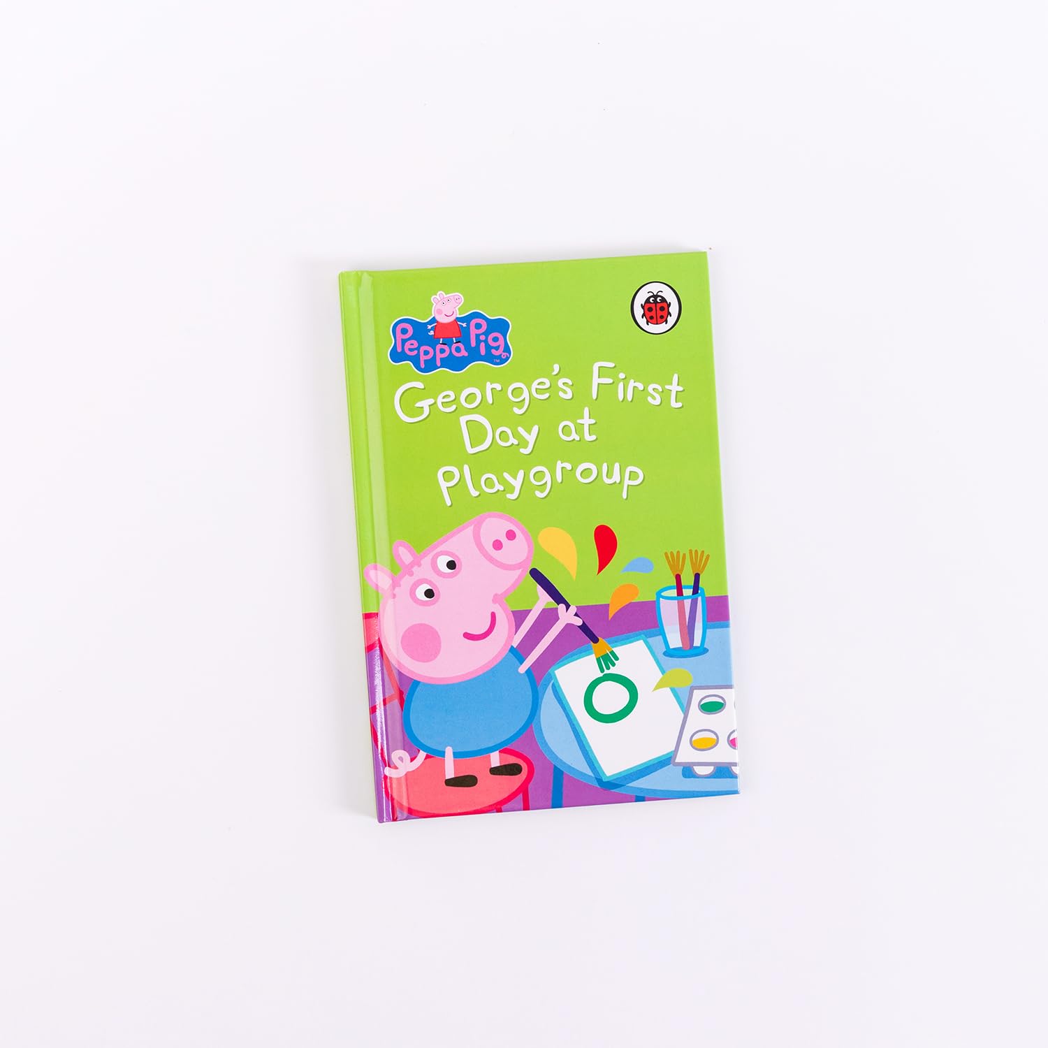 Open Peppa Pig hardback storybook page spread with illustrations from the bedtime collection