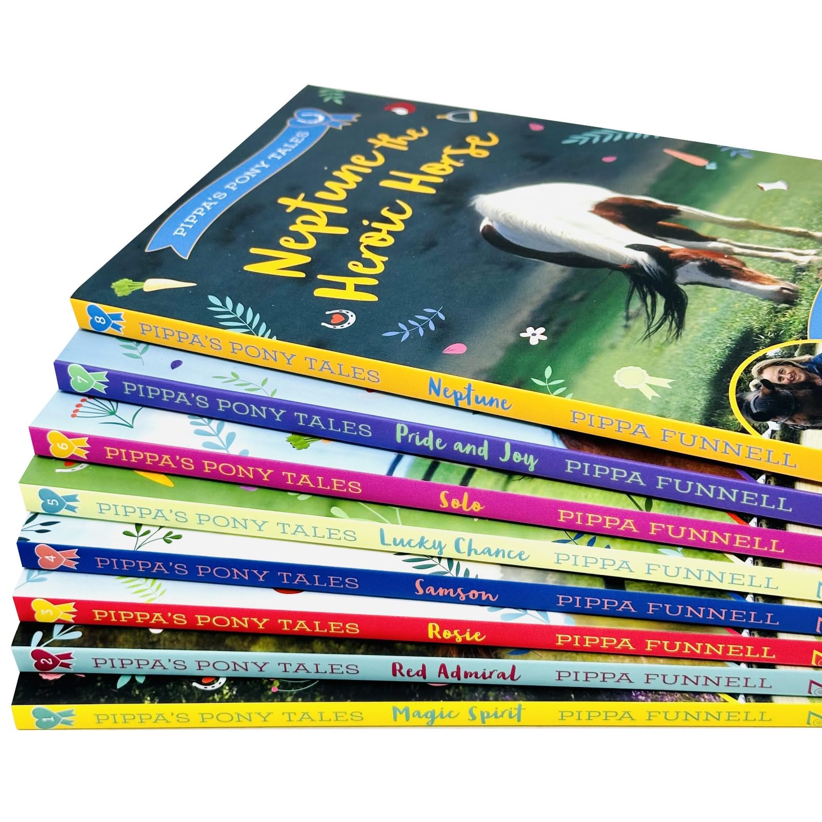 Close-up of Magic Spirit the Dream Horse and Red Admiral the Racehorse paperback covers from the Pippa's Pony Tales set