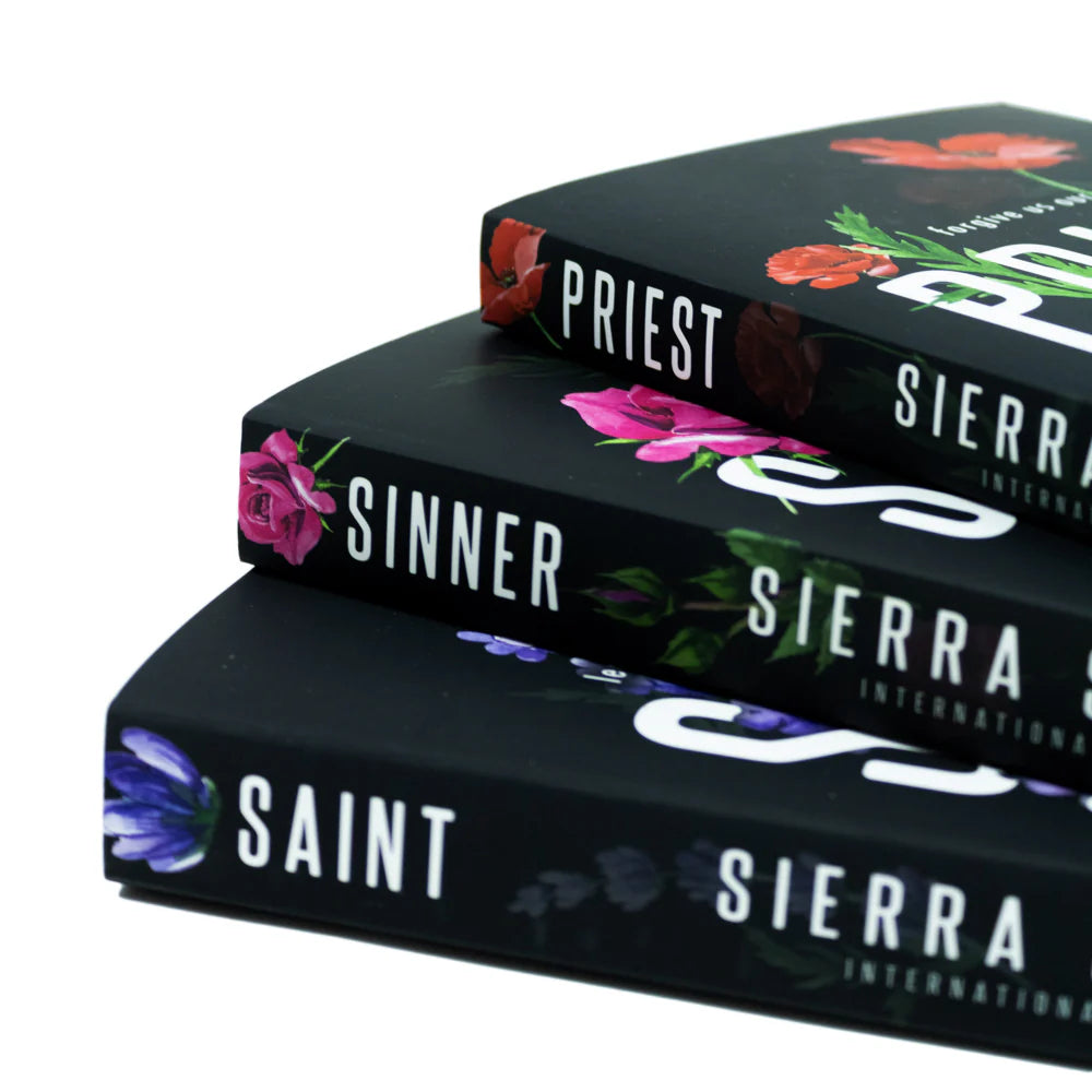 Priest Trilogy 3-book paperback set by Sierra Simone fanned out to show spines of Priest, Sinner, and Saint.