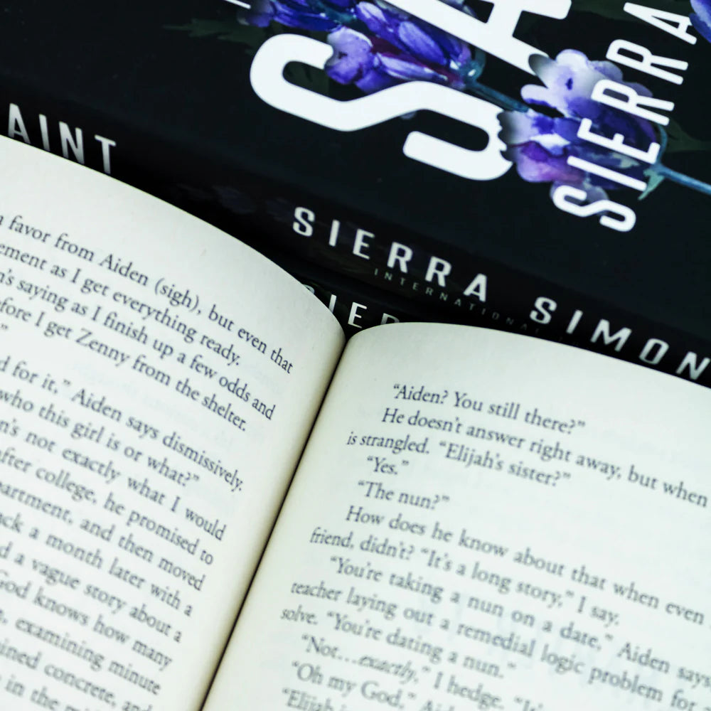 Stacked paperback view of the Priest Trilogy collection set by Sierra Simone showing full cover artwork.