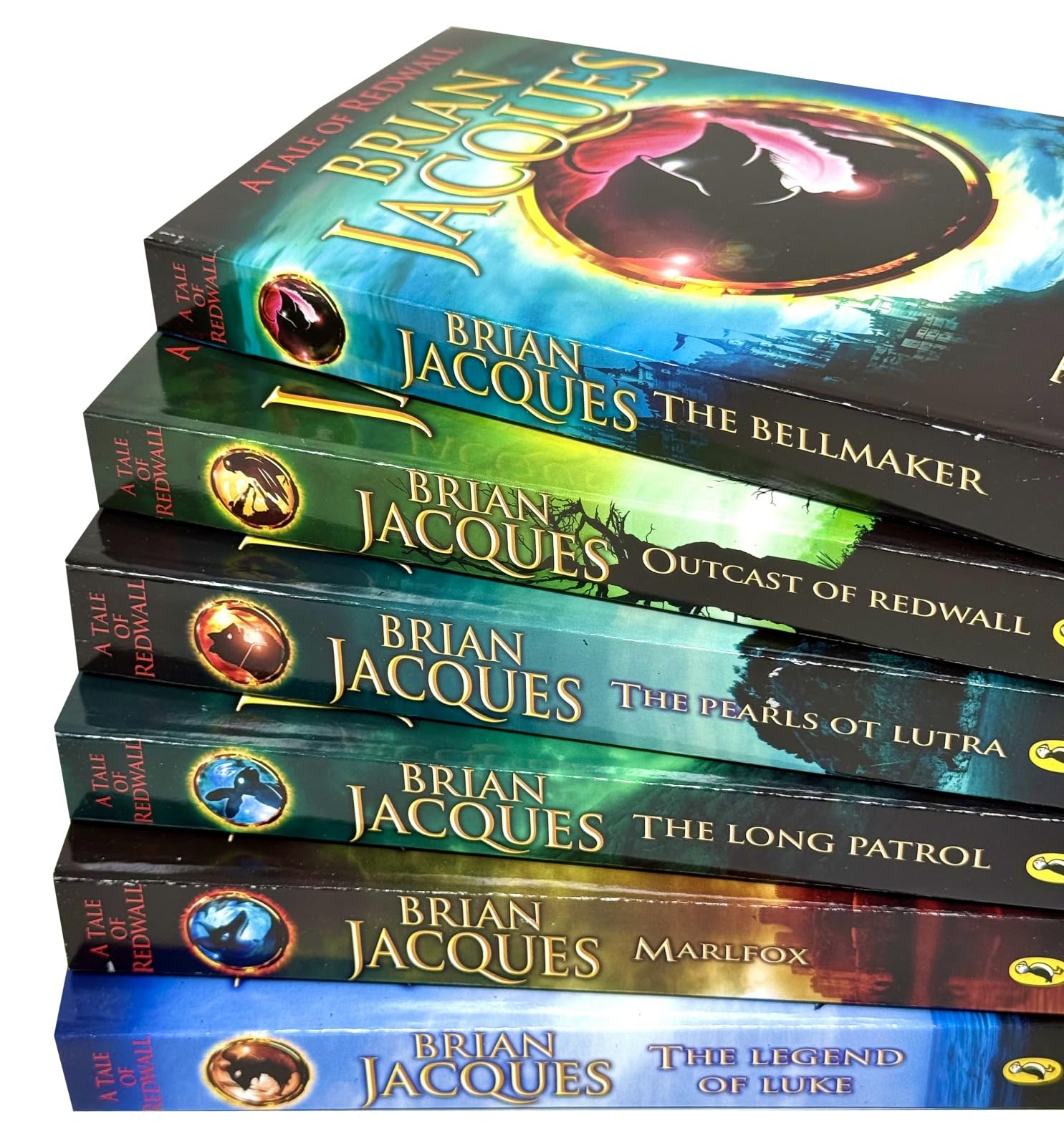 Close-up stacked view of the Redwall Books 7-12 paperback collection set by Brian Jacques, highlighting spine and cover details
