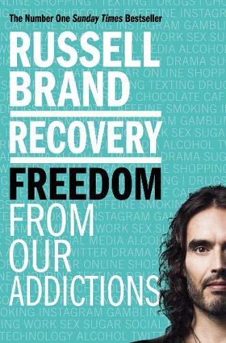 Russell Brand 2 book nonfiction set, Mentors and Recovery, fanned out against a blue background.
