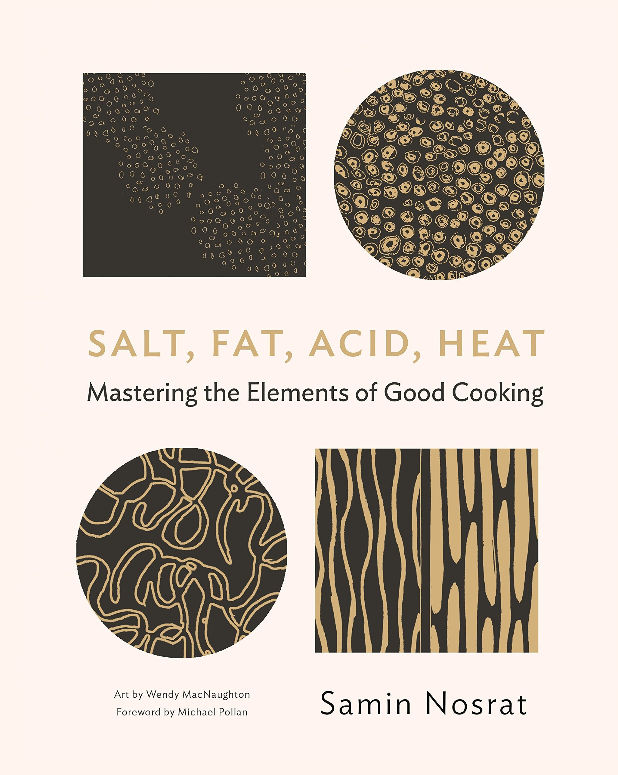 The Salt Fix and Salt Fat Acid Heat paperbacks fanned out together showing both spines and covers