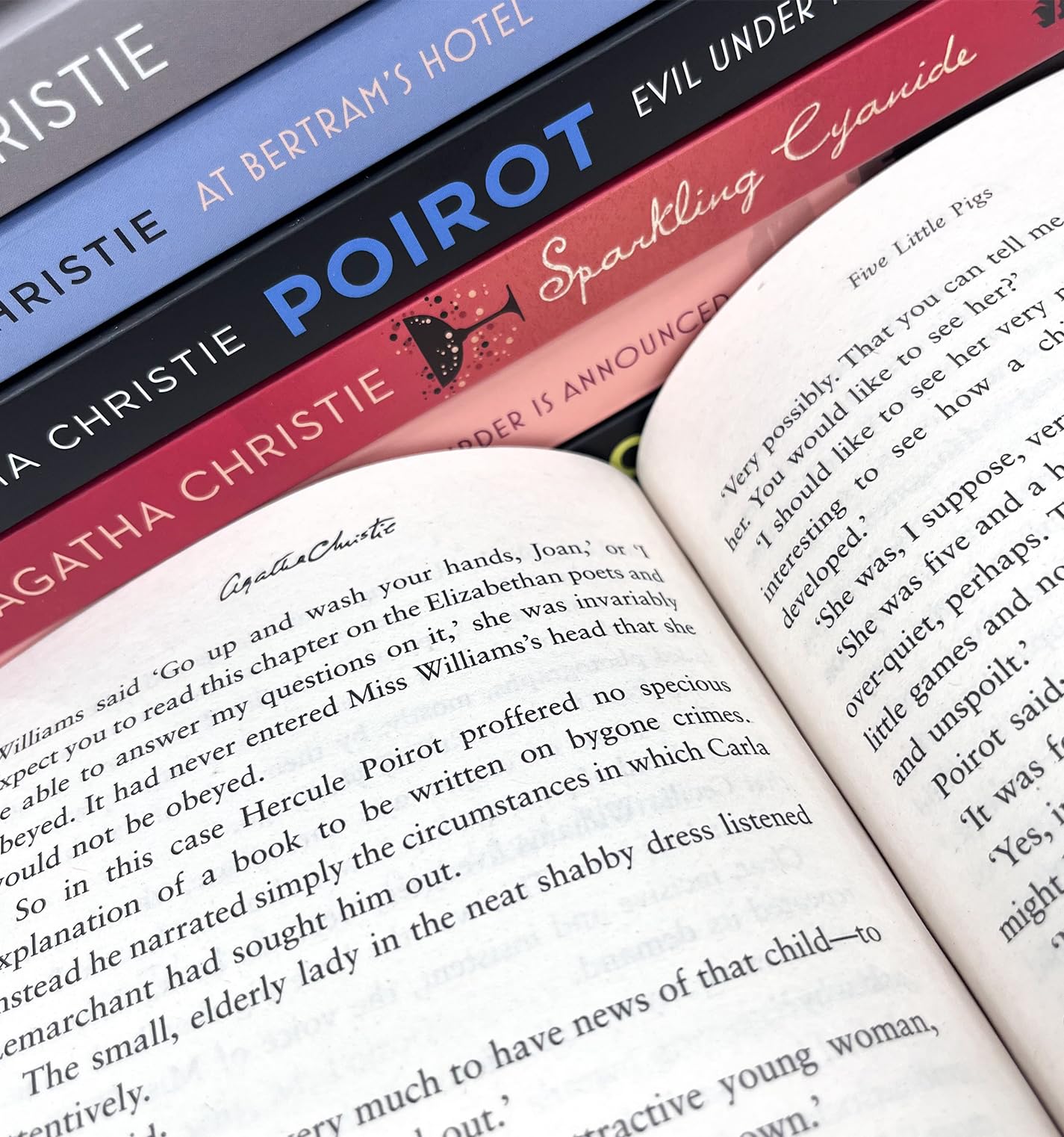 Close-up of the Seven Deadly Sins paperback collection spines and covers, showing the compact 7-book box set format.