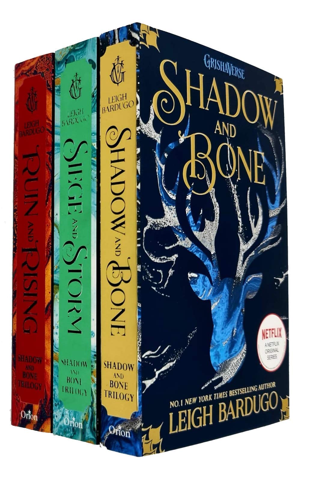 All three Grisha Trilogy paperbacks - Shadow and Bone, Siege and Storm, Ruin and Rising - fanned out together