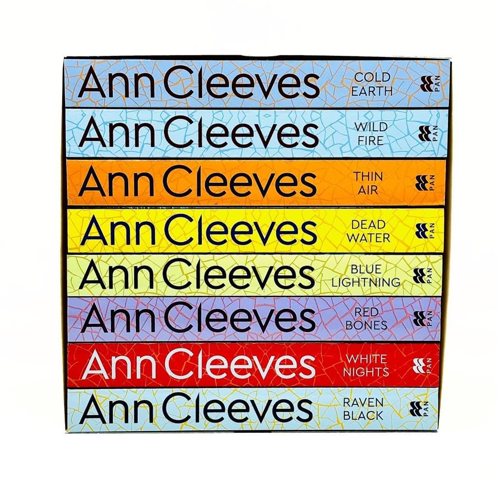 Close-up of the Shetland Series paperback book spines by Ann Cleeves, showing the full 8-book set side by side.